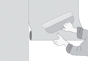 lepení fototapety a její uhlazování tapetovacím kartáčem