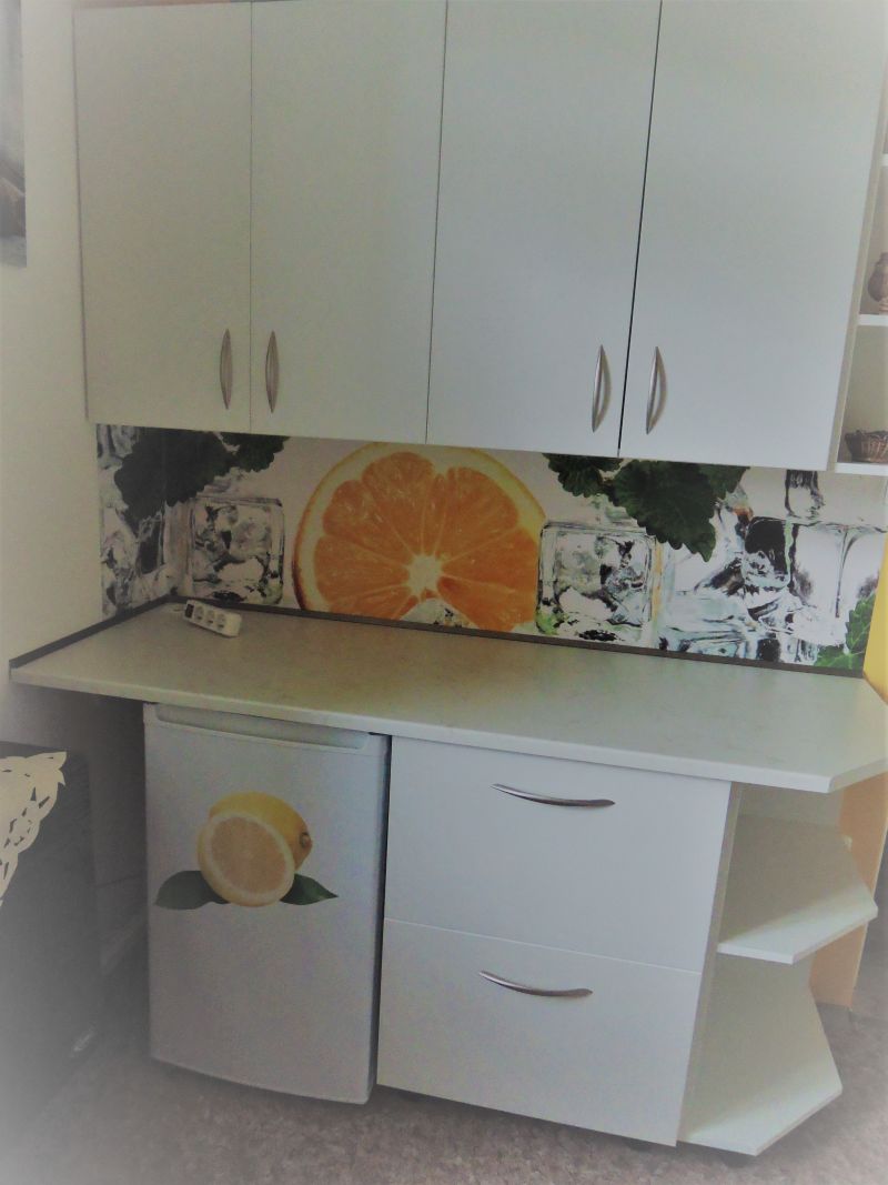 Samolepicí fototapeta do kuchyně Citrón a led